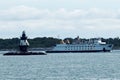 The Mary Ellen ferry passing the Orient Point Lighthouse